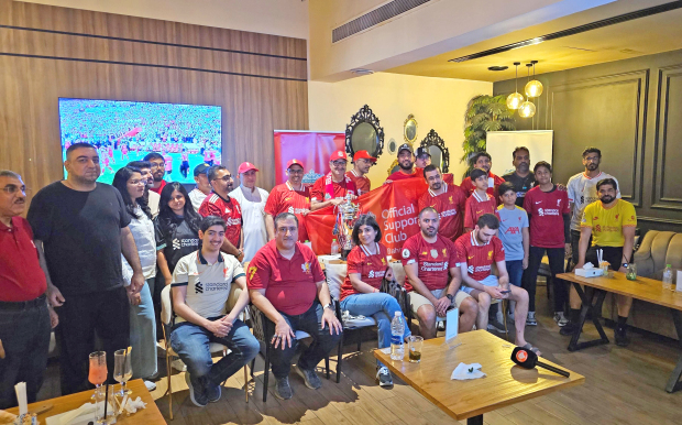 <p>The Official Liverpool Supporters Club Bahrain (OLSC Bahrain) hosted a special gathering for members and fans to mark Liverpool Football Club&rsquo;s win over Tottenham Hotspur to clinch their 20th English Premier League title.</p>
<p>To mark the occasion, OLSC Bahrain hosted a screening of the match.</p>
<p>The gathering brought together fans from all walks of life who support Liverpool FC. OLSC Bahrain chairman Fahad Alabbasi expressed his pride in both the club&rsquo;s historic achievement and the unity amongst fans in Bahrain.</p>
<p>&ldquo;This is not just a title; it&rsquo;s a celebration of identity, loyalty and family,&rdquo; he said. &ldquo;We are proud to stand behind this incredible team, and we look forward to many more unforgettable moments together.&rdquo; Right, OLSC Bahrain team members during the screening.</p>